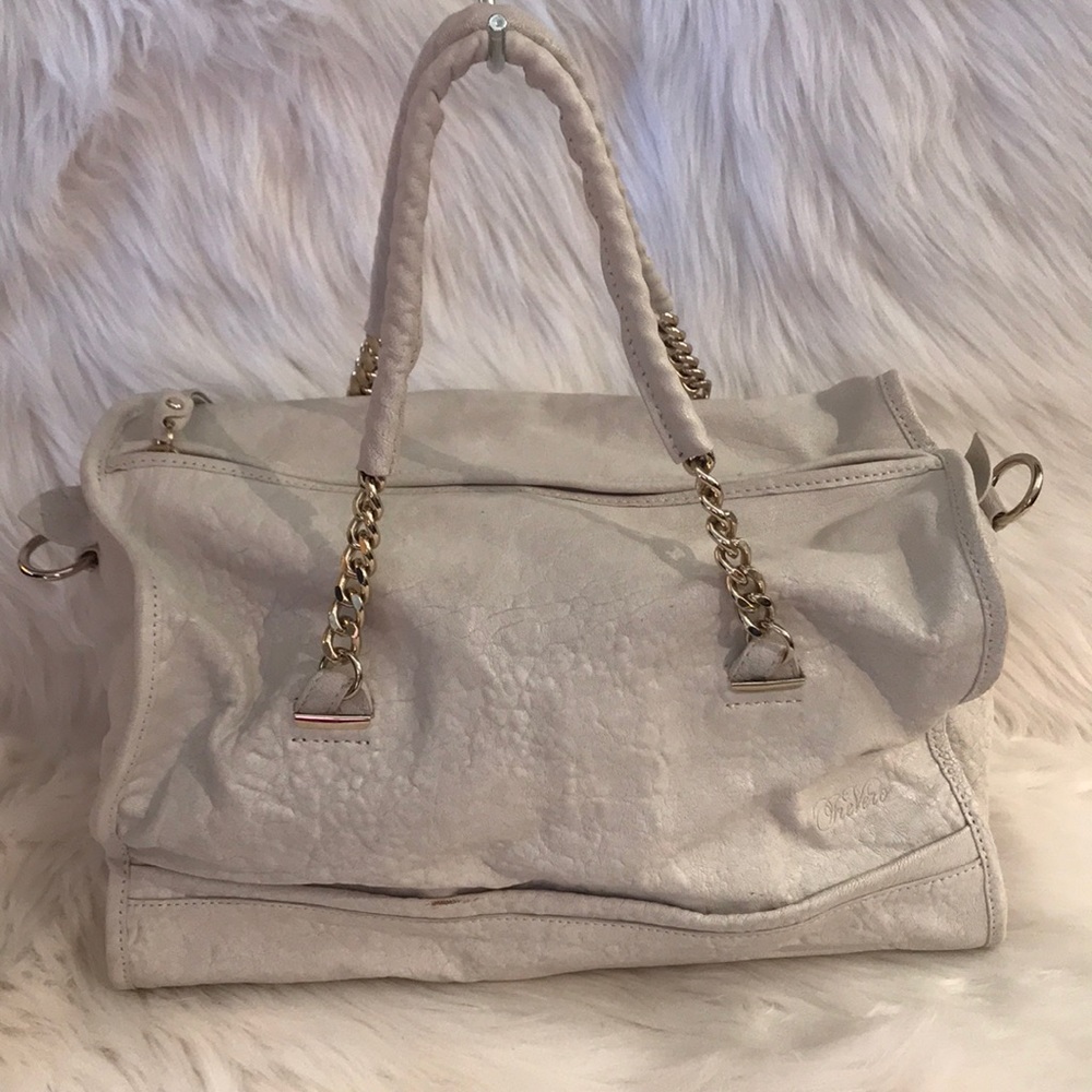 💯% Authentic Tre Vero off White hand bag.